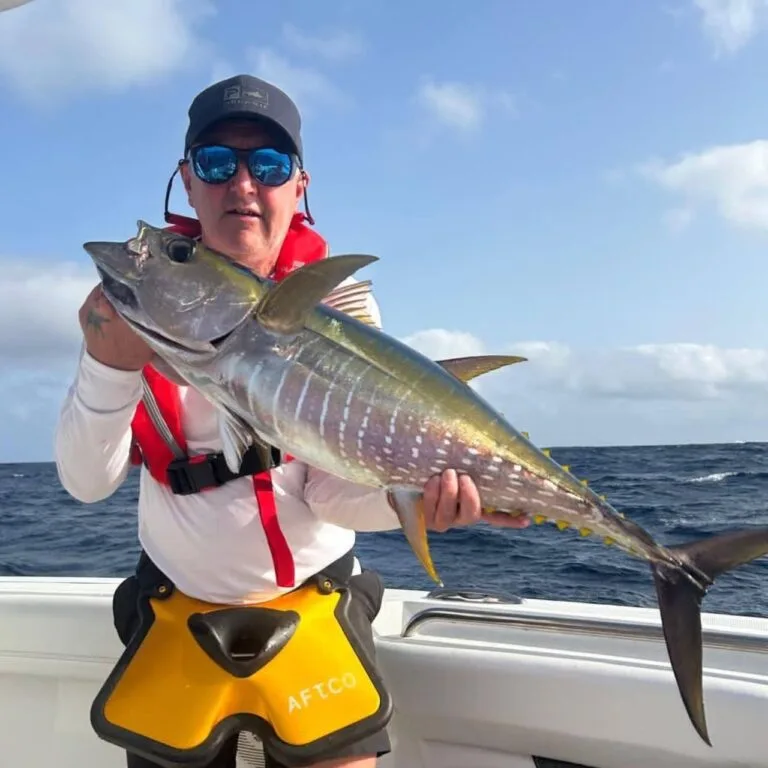 Happy client with yellow fin tuna